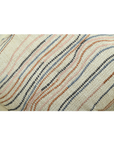 Chunky ivory cushion cover with flowy lines in brown, blue, pink, and black, perfect for home decor.