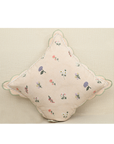 Tea Rose cushion featuring delicate pink fabric with lavender and peach motifs and scalloped edges for elegant home decor.