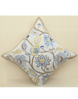 Vine cushion featuring colorful floral embroidery, soft cotton material, and jute trim, perfect for cozy home decor.