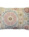 Decorative pillow with floral patterns on a white background