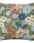 Floral patterned pillow with colorful flowers on a green background