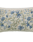 Decorative pillow with floral embroidery on a white background