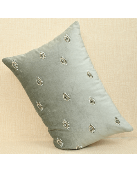 Hand-embroidered evil eye cushion cover on mint green velvet, 14x20 inches size, adding elegance and protection to any space.