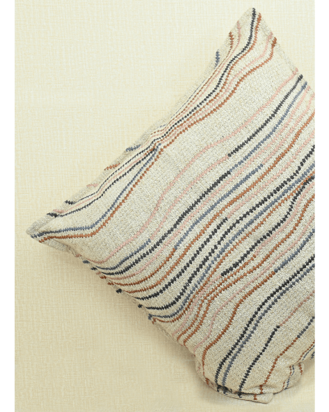 Chunky ivory cushion cover with embroidered flowy lines in warm tones for stylish home decor.
