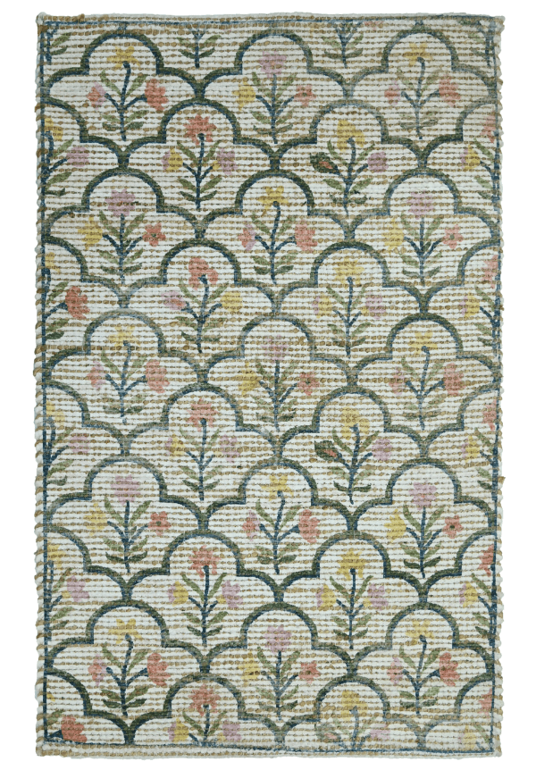 Patterned rug with leaf design on a white background