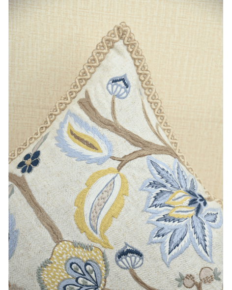 Vine cushion featuring intricate embroidery with colorful flowers and Jute trim, enhancing cozy home decor.