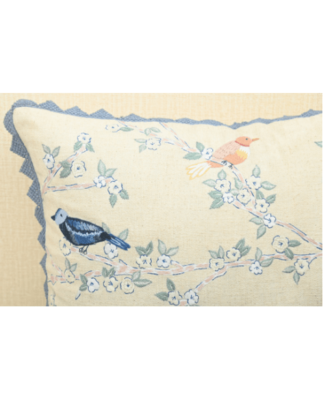 Hummingbirds cushion cover with intricate embroidery on cotton, featuring birds on branches and blue lace accents.