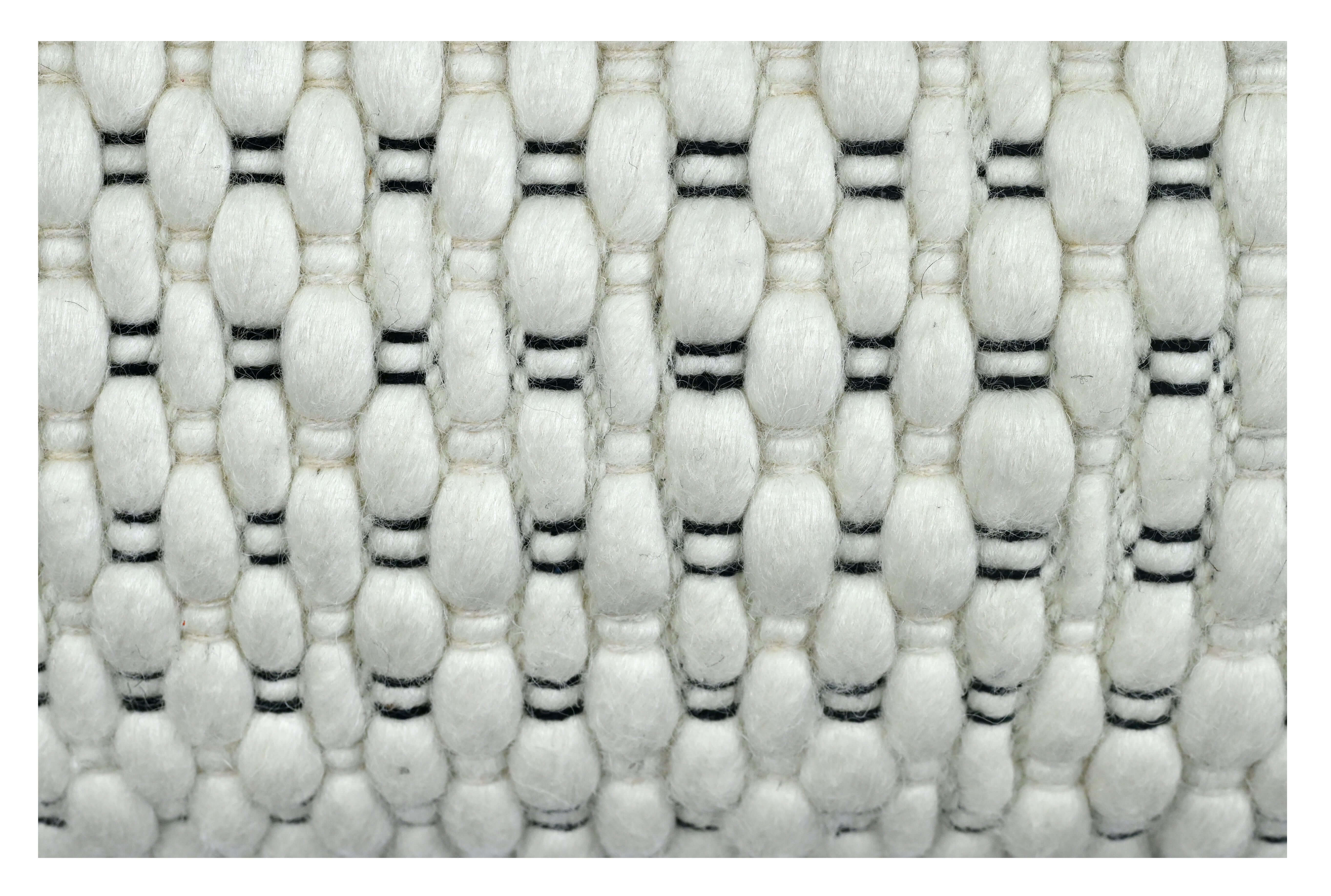 Augustina crafted from a premium cotton material cushion