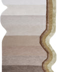 Multicolored striped rug with a gradient of brown, beige, and white on a white background
