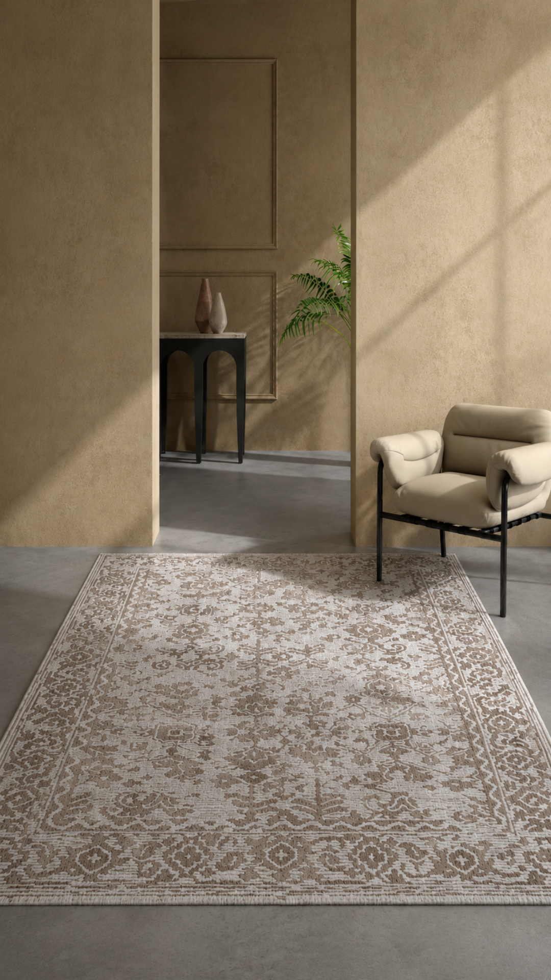 Patterned rug on a gray floor with a beige wall and chair in the background