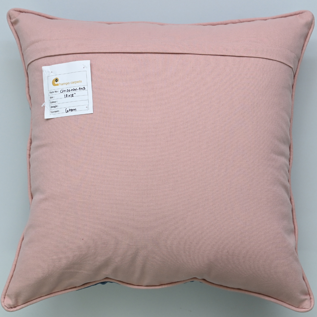 Pink pillow with a label on a gray background