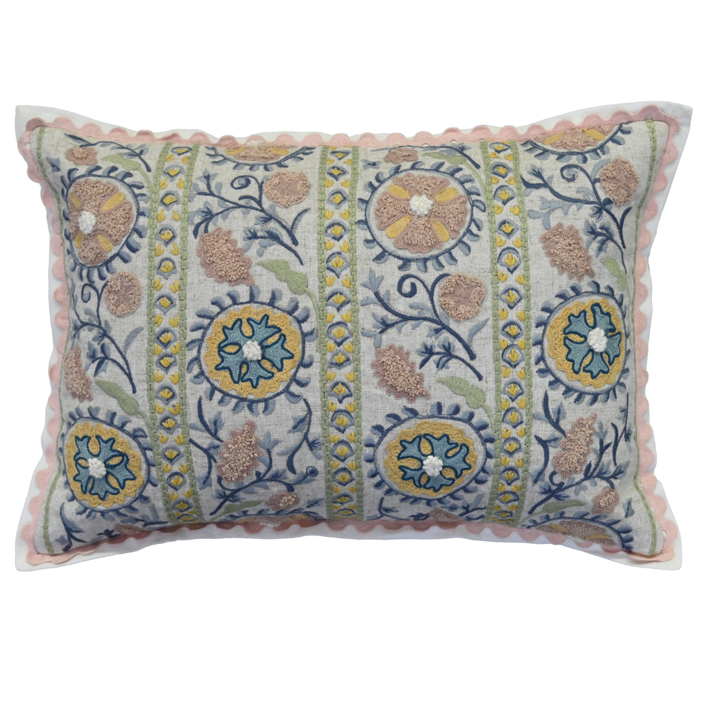 Decorative pillow with floral patterns on a white background