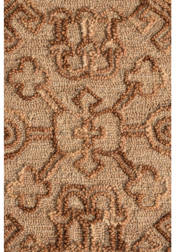 Close-up of monochrome motifs on mustard hand tufted wool rug