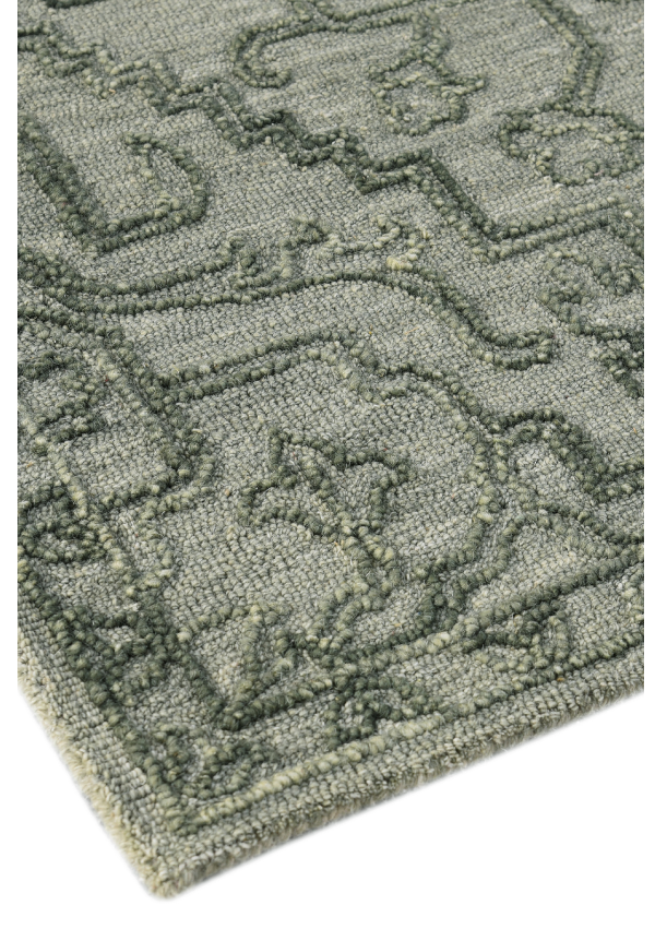 Loop-on-loop texture detail of olive Persian wool rug