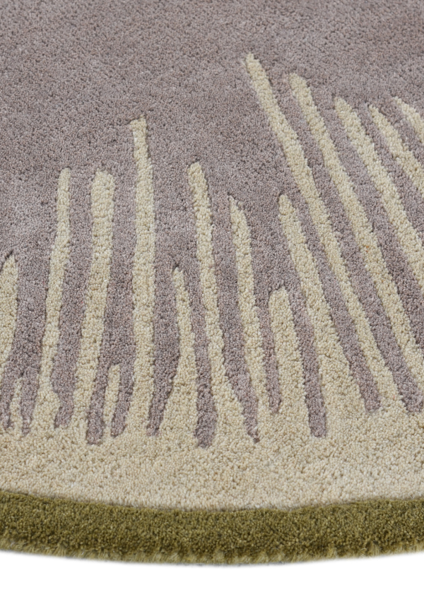 Close-up of Halo Verge handcrafted wool rug with geometric edge detailing