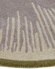Close-up of Halo Verge handcrafted wool rug with geometric edge detailing