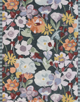 Floral patterned rug with colorful flowers on a dark background