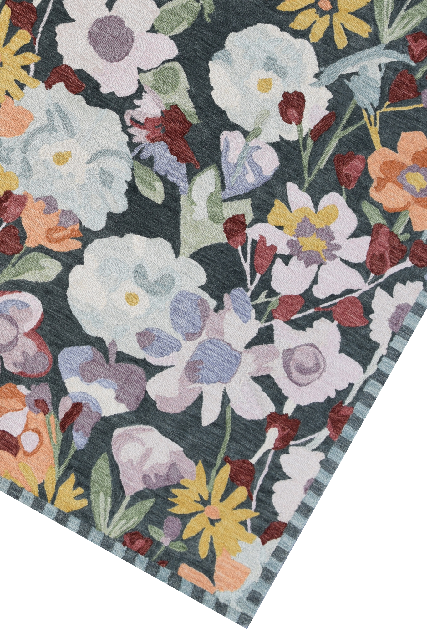 Floral patterned rug with colorful flowers on a dark background