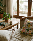 Cozy living room with a sofa, coffee table, and decorative pillows.